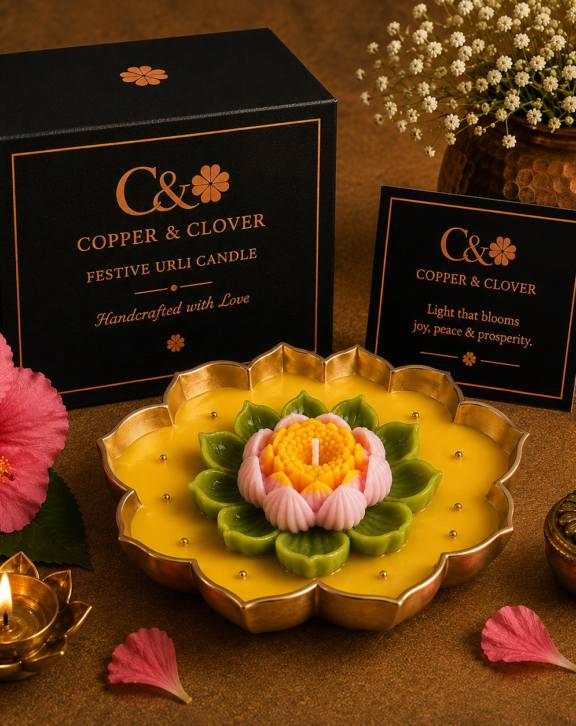 An expression of light, artistry & celebration. Handcrafted in an elegant golden urli, this exquisite candle brings together luminous ivory wax and a richly sculpted floral arrangement in vibrant festive hues. Every detail is thoughtfully crafted to create a statement of Indian artistry, warmth and refined celebration. Made to grace festive spaces, joyful gatherings, new beginnings and cherished occasions. Copper & Clover Handcrafted with Love